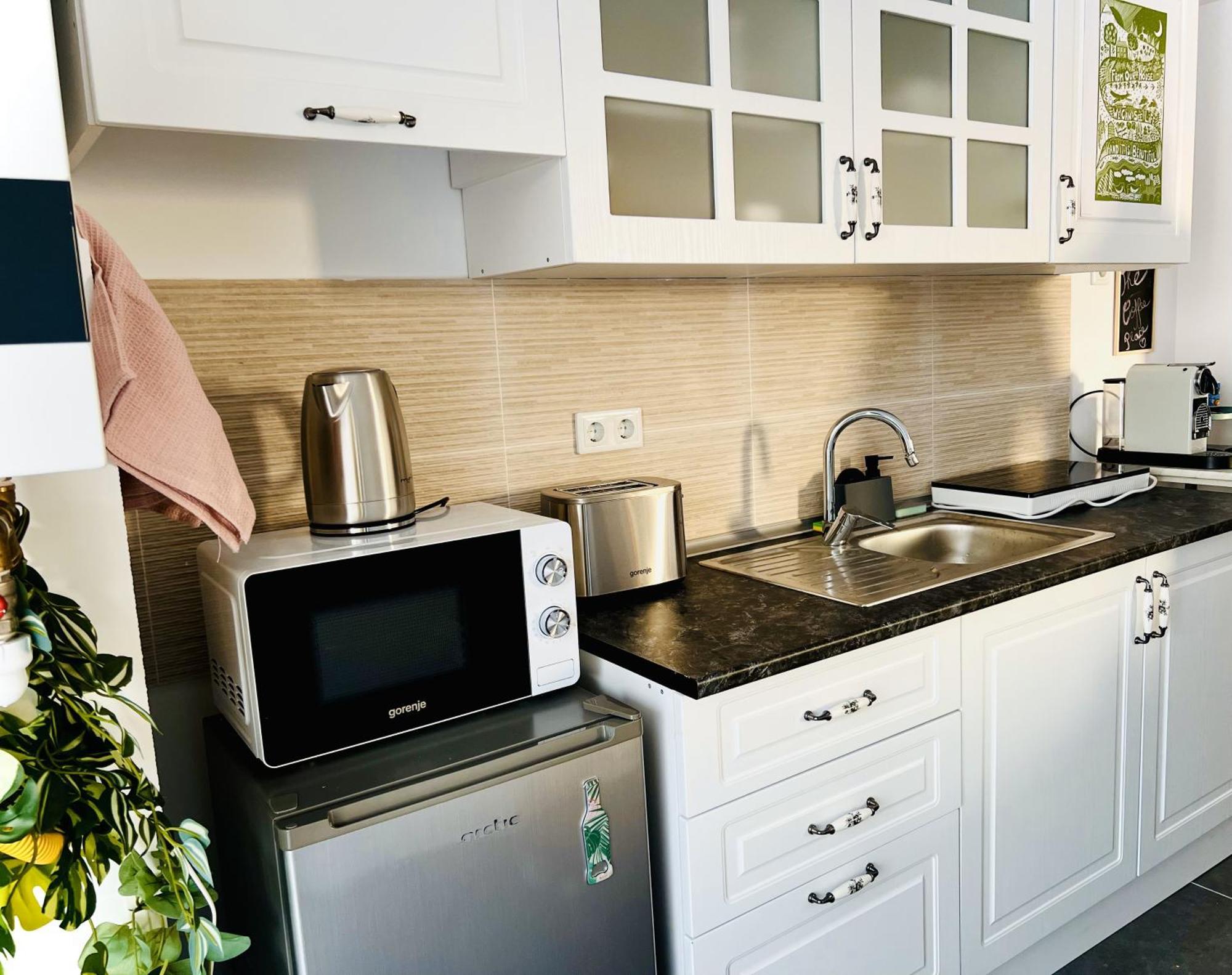 Airport Gardens Loft Apartment Отопени Екстериор снимка